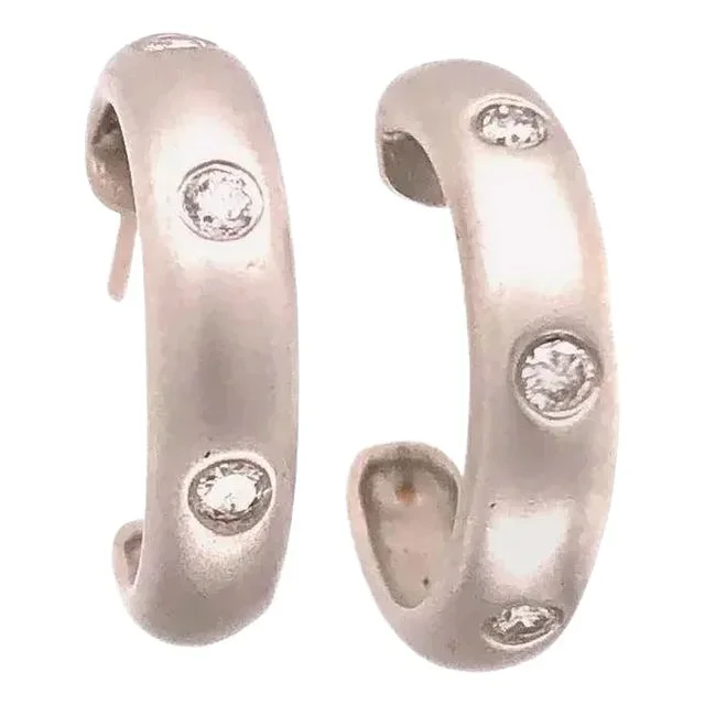 14 Karat White Gold Round Three Diamond Earrings
